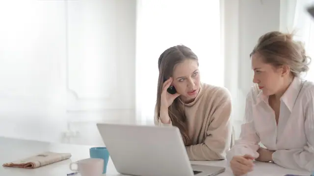 Person comparing IPTV subscription pricing on a laptop